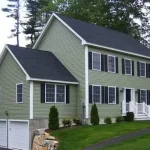 alt= view of a house with vinyl siding in Vermont